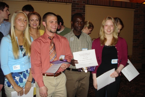 Albert Kertho accepts the Chemistry Catalyst Award